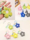 เซ็ตพวงกุญแจดอกทานตะวันน่ารัก คละสี 5 ชิ้นต่อเซ็ท